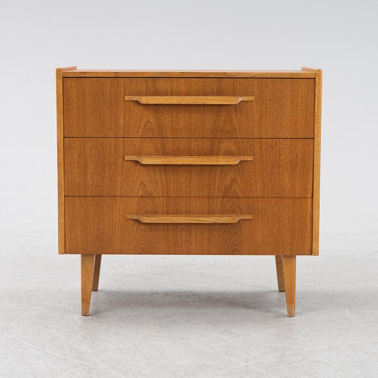 A teak veneered chest of drawers, Häggeryda Möbelfabrik, Nilsson & Co, Glimåkra, 1950's/60's.
