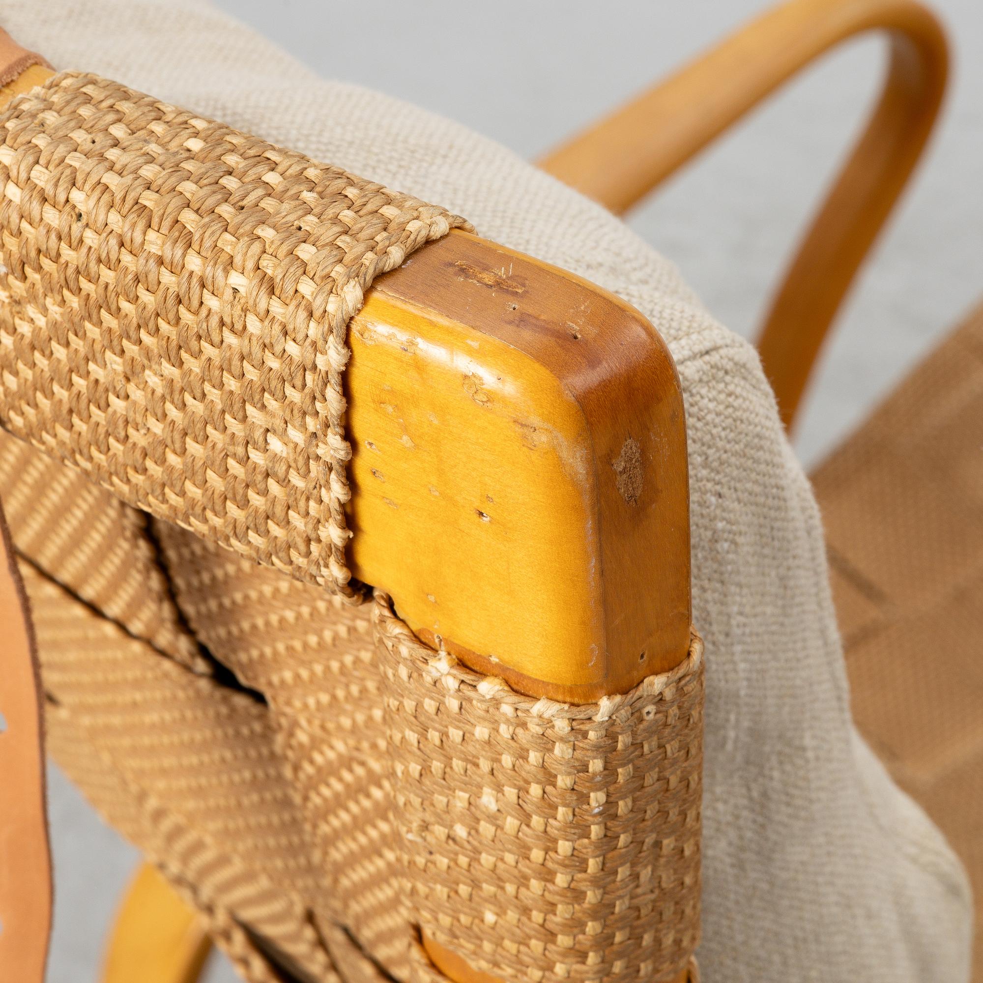 Bruno Mathsson, a lounge chair with footstool "Pernilla 1", Firma Karl Mathsson, Värnamo, circa mid-20th century.