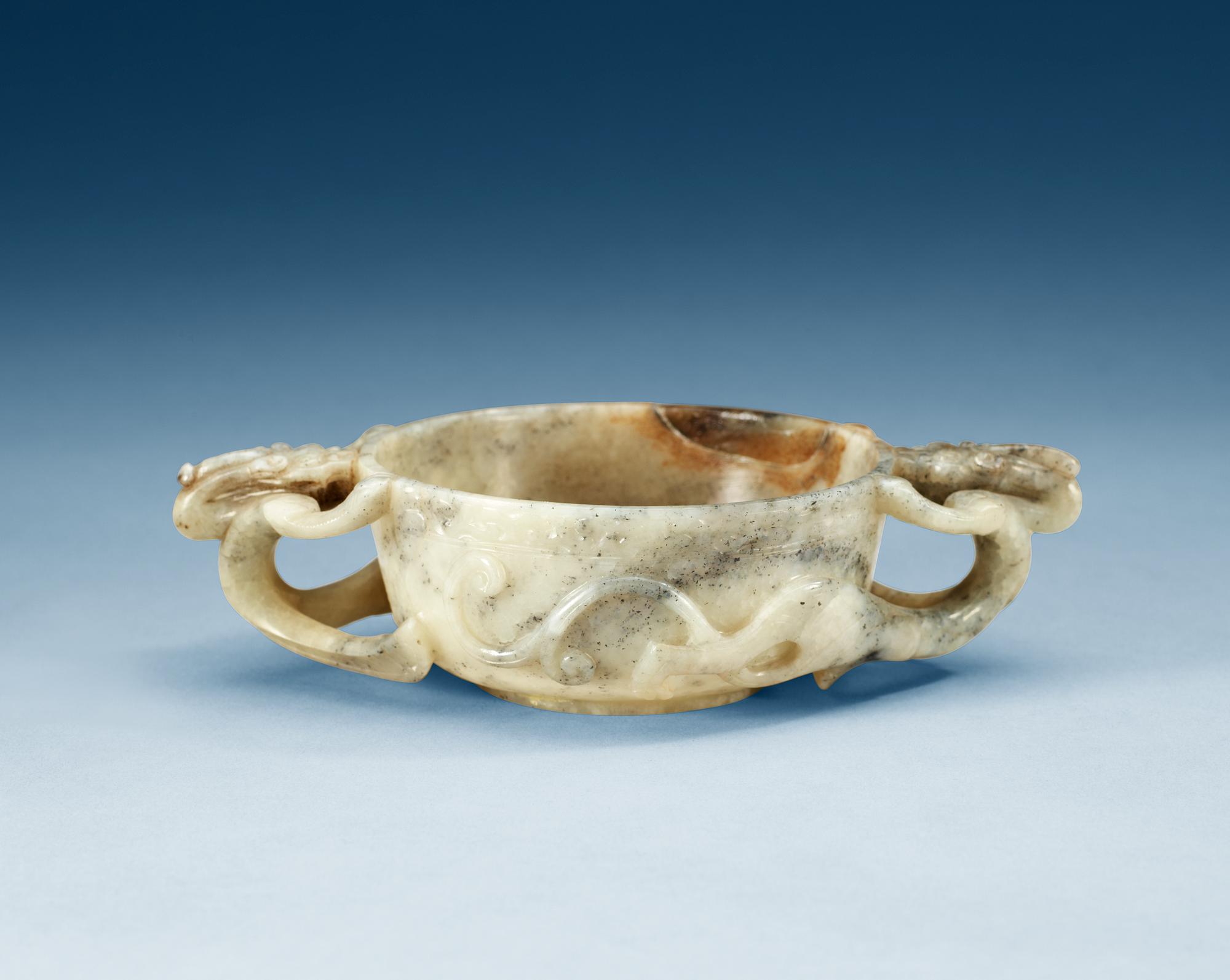 A carved nephrite ceremonial wine cup, late Qing dynasty.