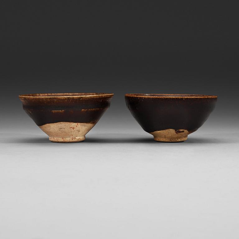 A set of two odd temmoku jianyao bowls, Song dynasty (960-1279).
