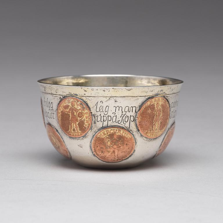 A Swedish 18th century parcel-gilt tumbler with copper coins, mark of Mikael Hammberg, Harnosand (-1758-1789(1790)).