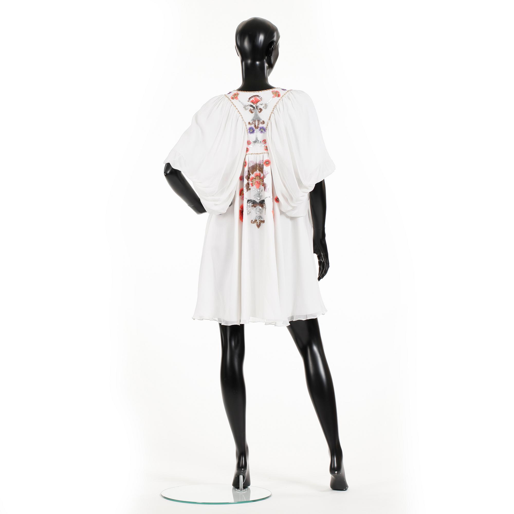 MATTHEW WILLIAMSON, a white silk tunic.