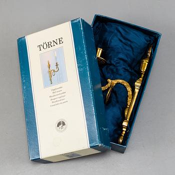 A pair of brass 'Törne' wall sconce, Ikeas 18th century Swedish Furniture series.