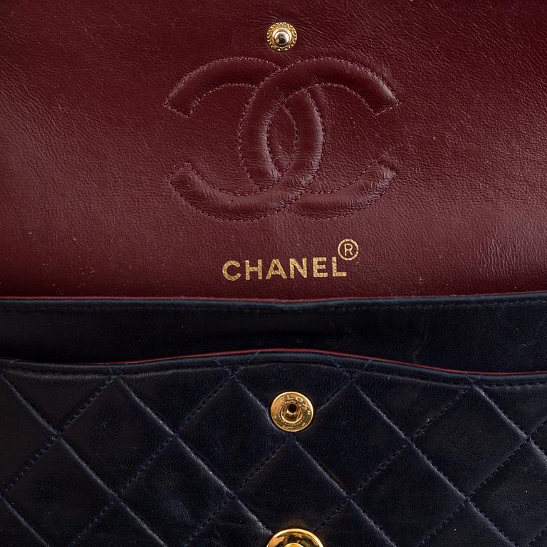 Chanel, a navy leather 'Double Flap Bag', 1989-91.