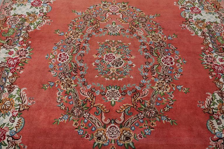 A Tabriz carpet, c. 410 x 199 cm.