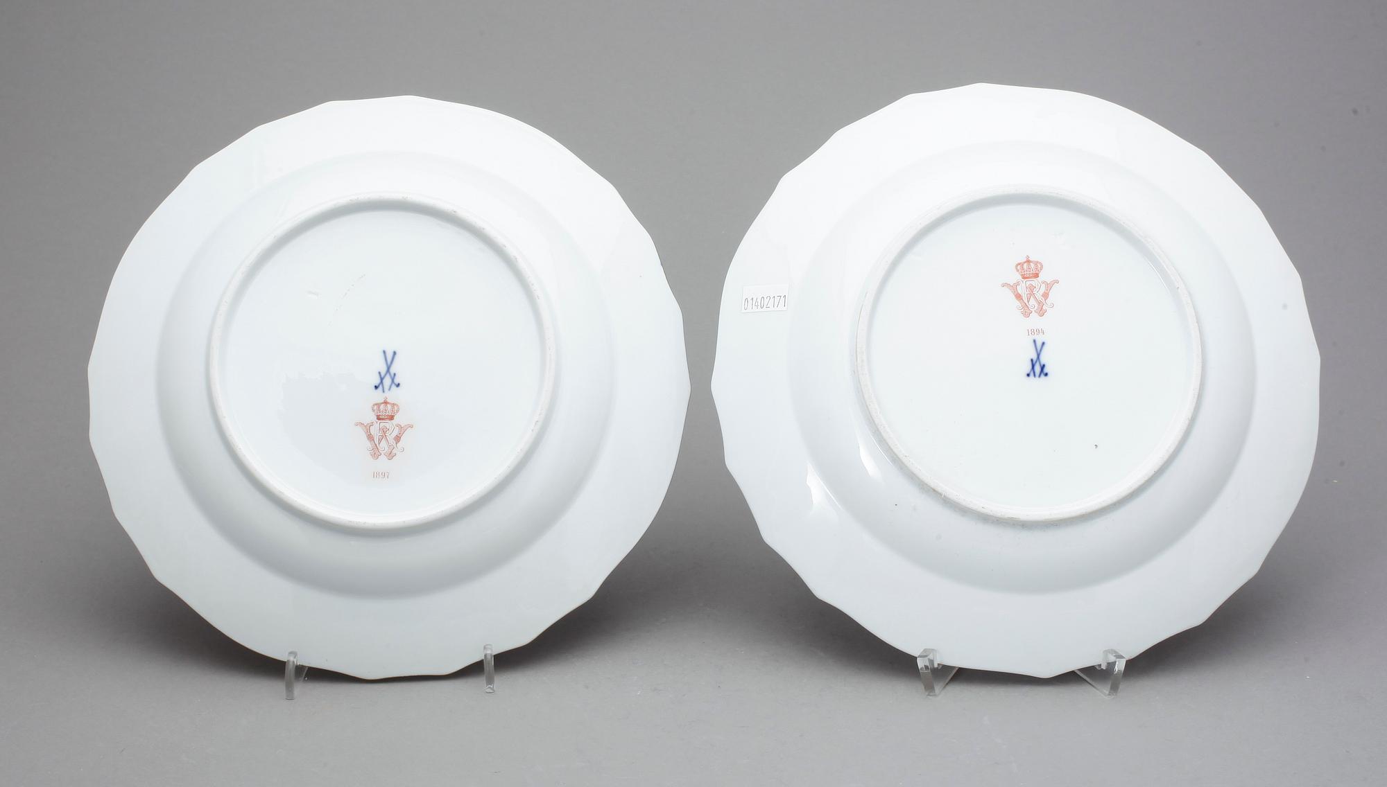 A pair of Meissen dinner plates, "Scattered flowers" with Kaiser Wilhelm II's monogram, dated 1894 and 1897.