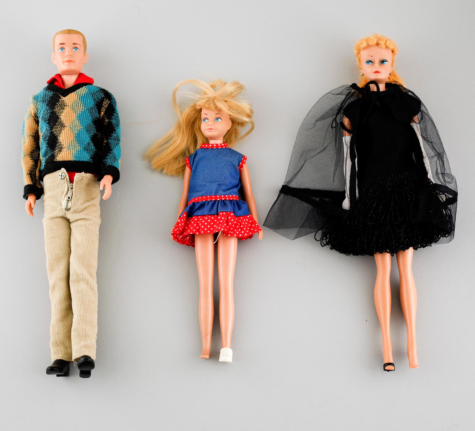 Three 1960s Barbie dolls with accessories, Mattel.