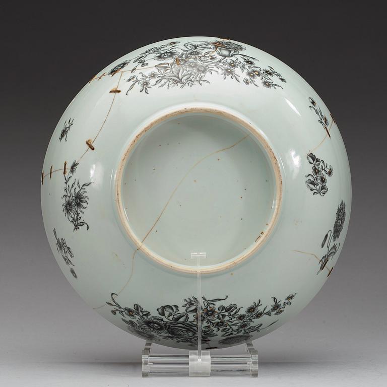 A grisaille punch bowl and stand, with a Swedish Bank note, Qing dynasty, Qianlong dated 1762.