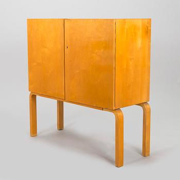 Alvar Aalto, mid-20th century '810' cabinet and a 
'69'chair Oy Huonekalu- ja Rakennustyötehdas Ab.