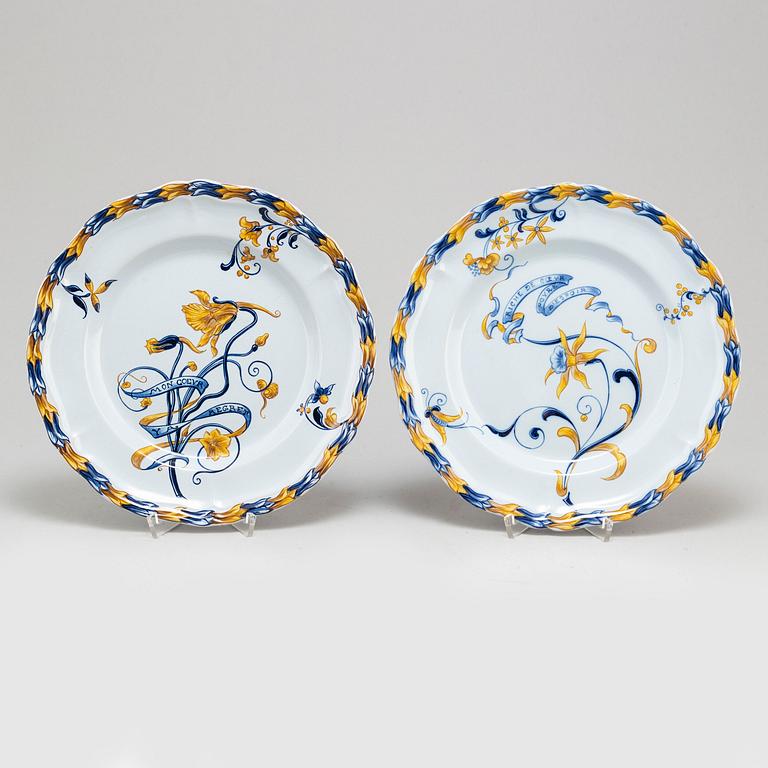 A set of four french faience cabinet plates signed Emile Gallé, Nancy. C. 1900.