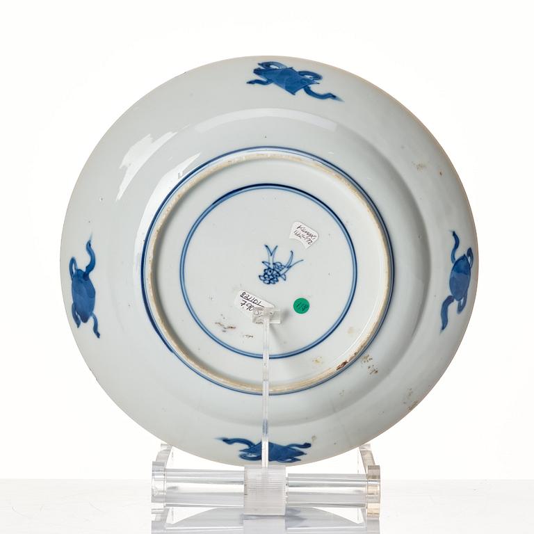 A set of four blue and white dinner plates, Qing dynasty, Kangxi (1662-1722).