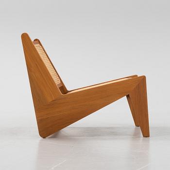 Pierre Jeanneret, a teak and rattan '058 Kangaroo' easy chair, Cassina, Italy.