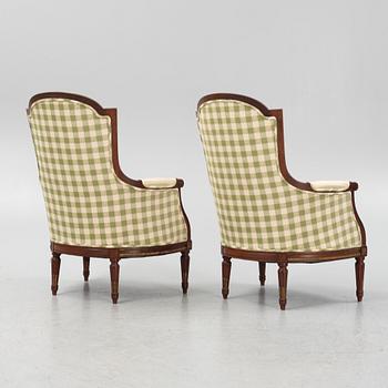 A pair of bergère armchairs, Louis XV style.