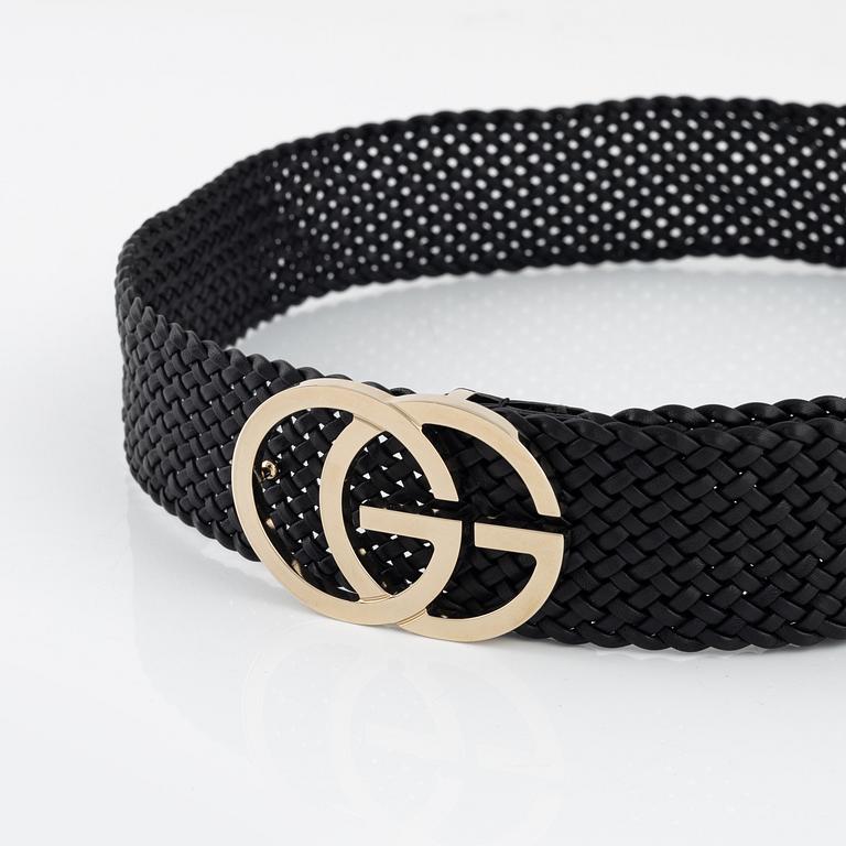 Gucci, a leather belt.