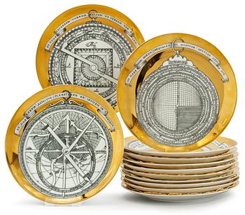 10. A set of twelve Piero Fornasetti 'Astro labio' porcelain plates, Milan, Italy.