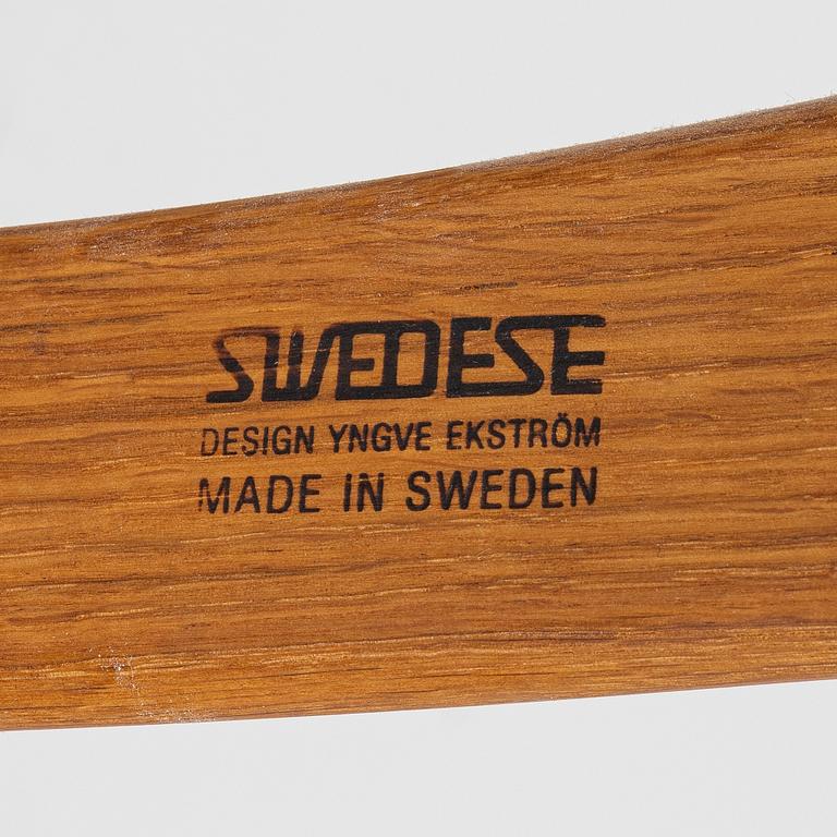 Yngve Ekström, a 'Lamino' armchair with ottoman and sidetable, Swedese, Sweden, 21st century.
