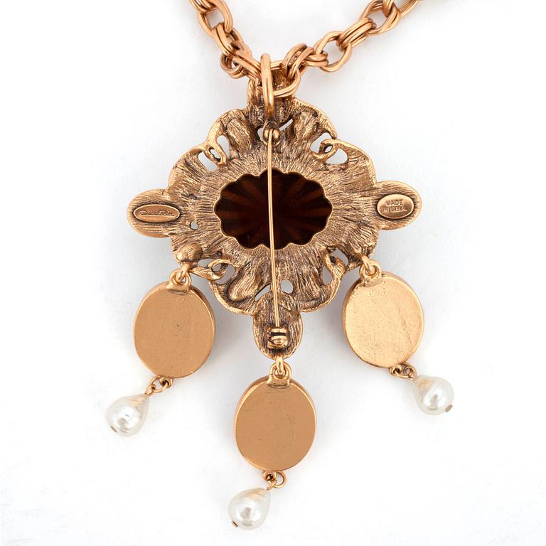 OSCAR DE LA RENTA, a goldcolored necklace with decorative stones.