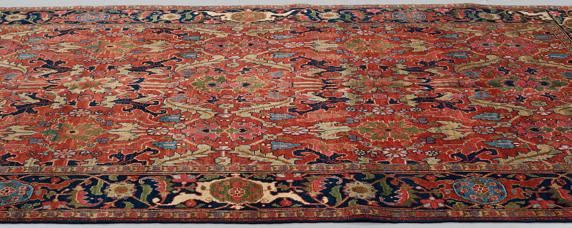 A CARPET, a semi-antique Heriz, ca 322-327 x 226,5 cm.