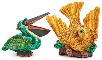 384. Two Gunnar Nylund stoneware figures, a parrot and a pelican, Rörstrand.