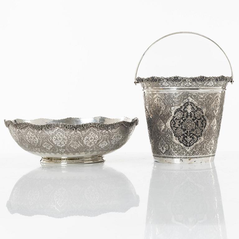 A Persian silver bowl and a silver bucket, 20th century.