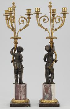 A pair of French 19th century three-light candelabra.
