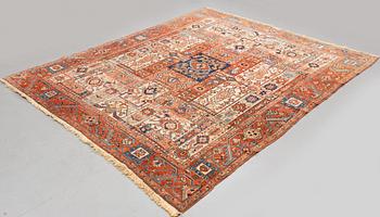 A carpet, antique Heriz, ca 334 x 271-276 cm ( ca 1-4 cm flat weave at the ends).