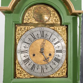 A painted grandfather clock numbered 90  by L Ruuth  first half of the 18th century.
