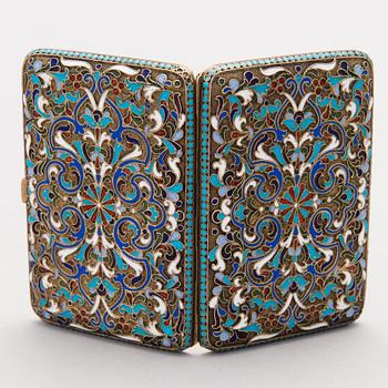 A Russian enamelled parcel-gilt cigarette case by Nikolai Zverev, Moscow 1908-1917.