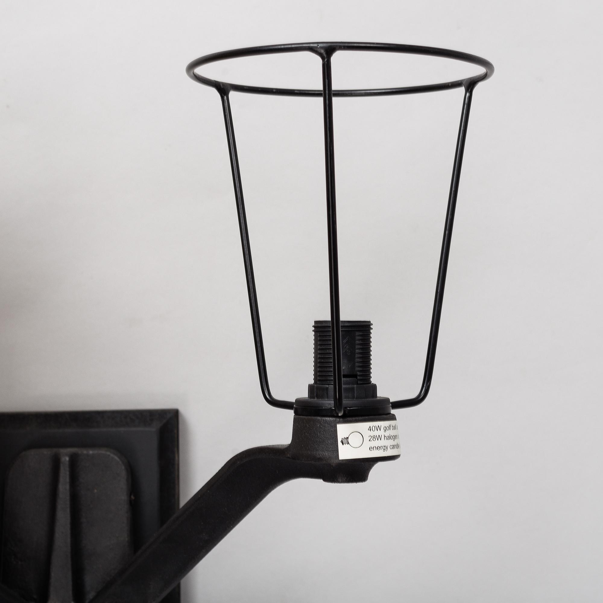 TOM DIXON, a pair of 'Base' wall light.