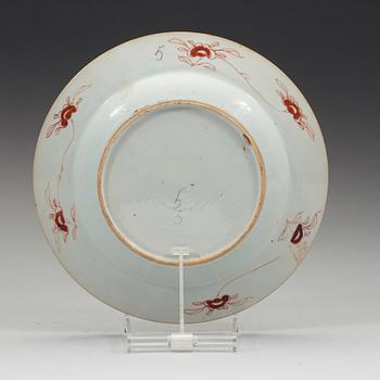 An export porcelain 'Pompadour' armorial plate, Qing Dynasty, circa 1745.