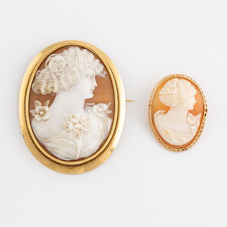 Two brooches, 18K gold with carved shell cameo.