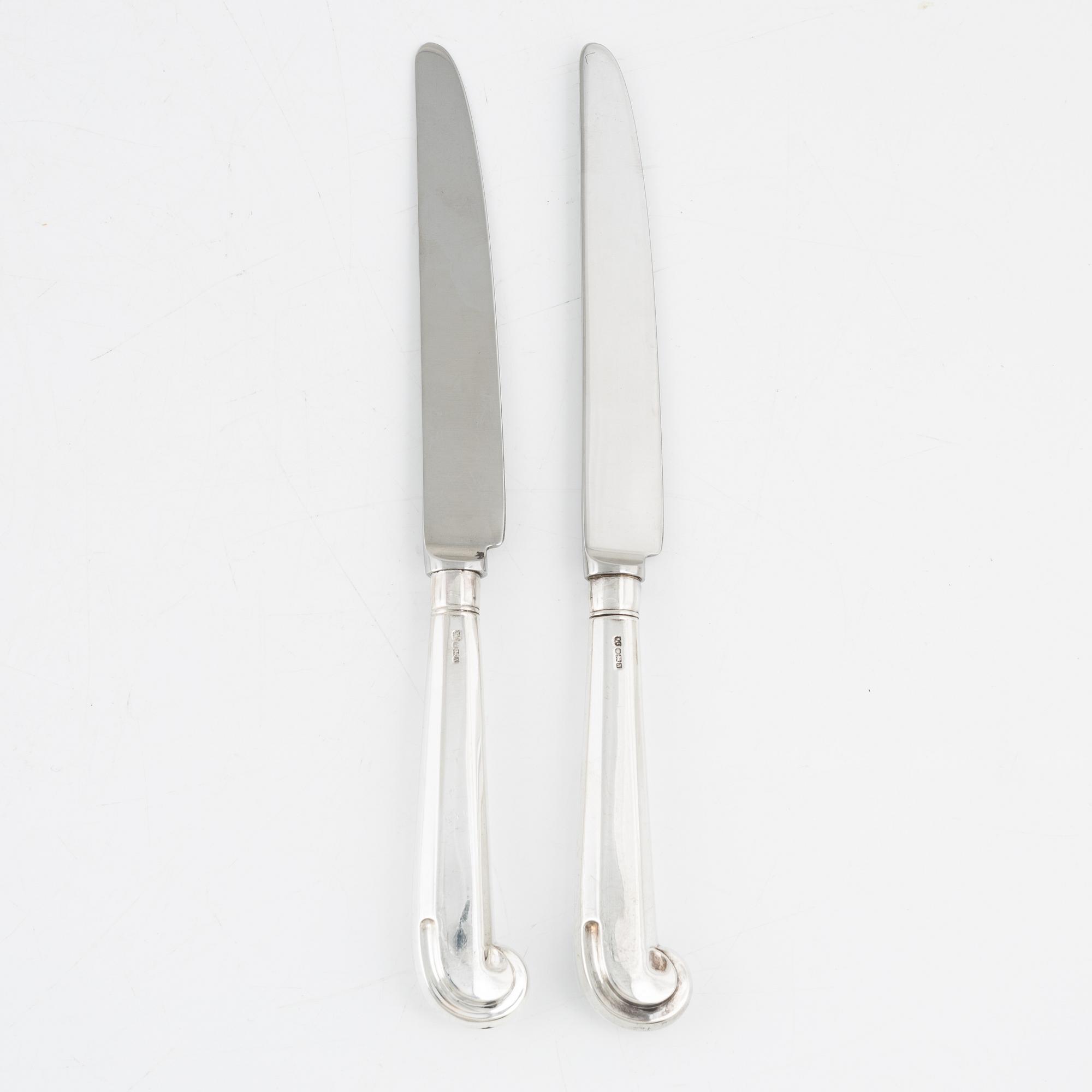 A set of English Silver Pistol Grip Knives, mark of Strickett & Loder, Sheffield 1987 (12 pieces).