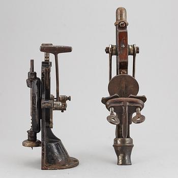 Two wine bottle openers, one Eskilstuna, circa 1900.