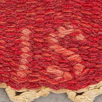 A Swedish flat weave rug signed IS ca 240 x 169 cm.