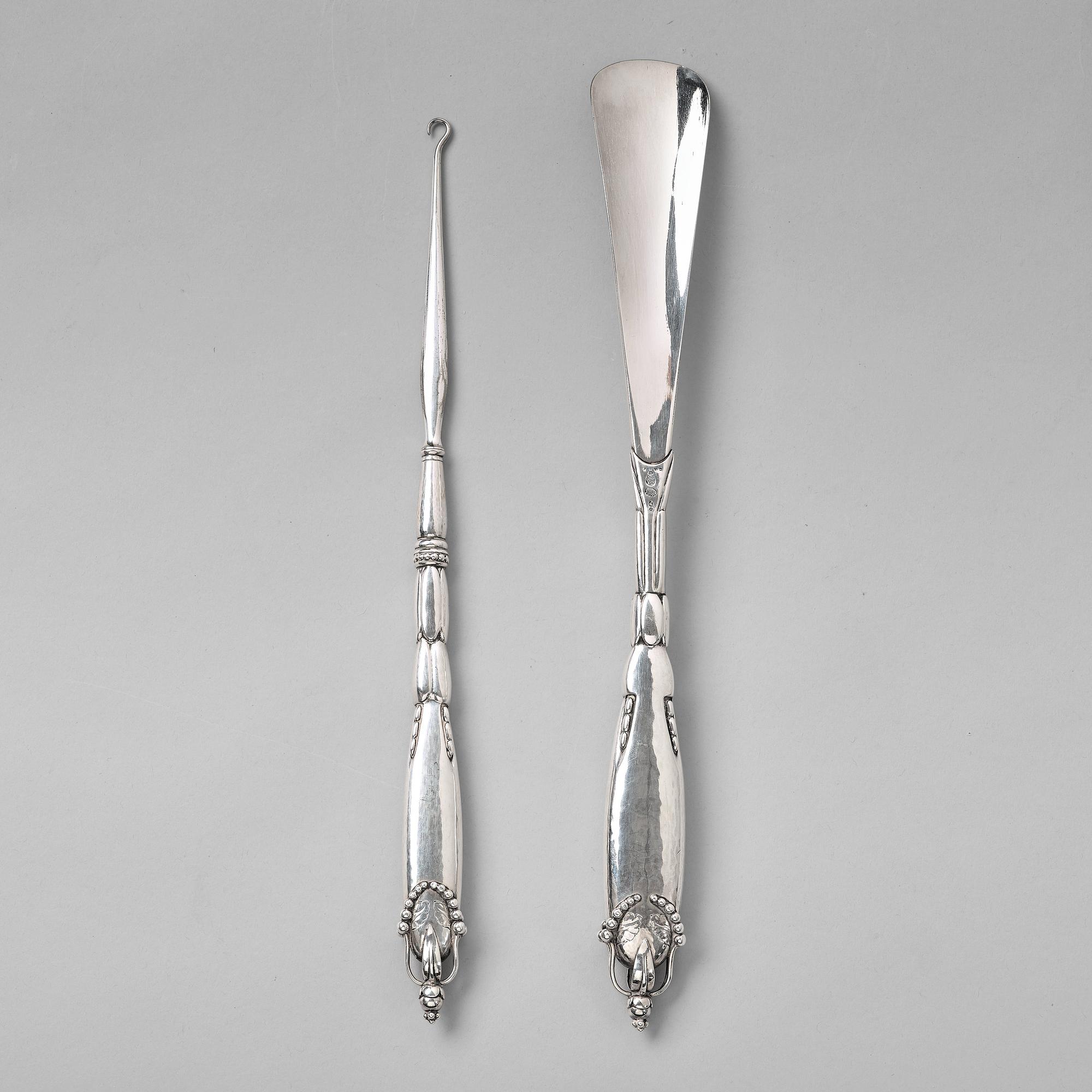 Georg Jensen, skohorn och kängknäppare, Köpenhamn ca 1918-20, 830/1000 silver.