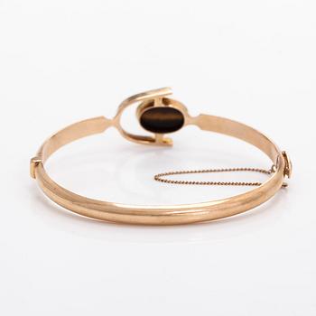 Eero Rislakki, armband, 14K guld och tigeröga, Westerback Helsingfors 1957.