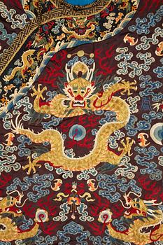 A Chinese embroidered silk robe, late Qing dynasty, circa 1900.