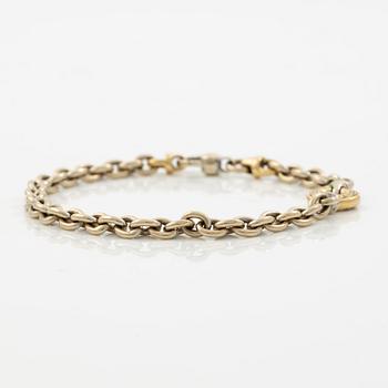 Bracelet 18K gold in various colour variations with round brilliant-cut diamonds.