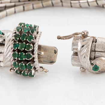 Armband 18K vitguld med fasettslipade smaragder.