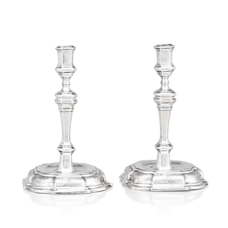 A pair of Swedish early 18th century silver candlesticks, mark of Petter Ersson Lund, Stockholm 1727.