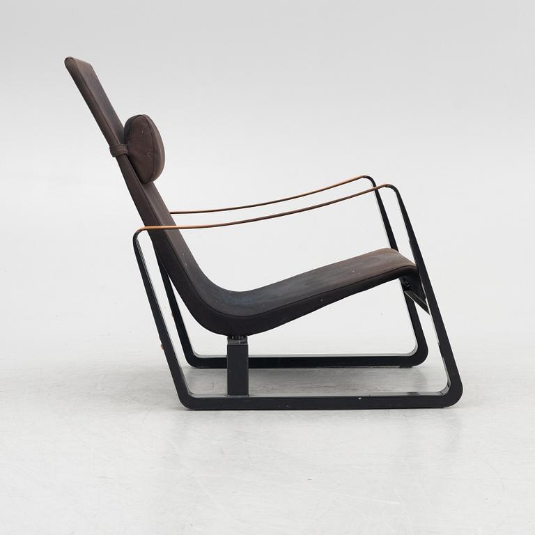 Jean Prouvé, a 'Cité' easy chair, Vitra, 2012.