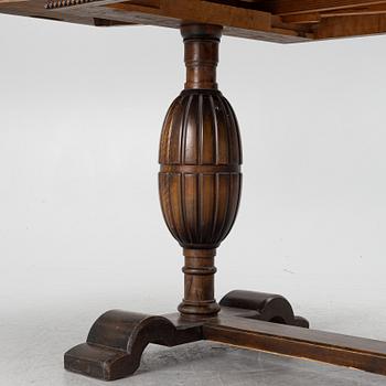 A dining table, 1920s.