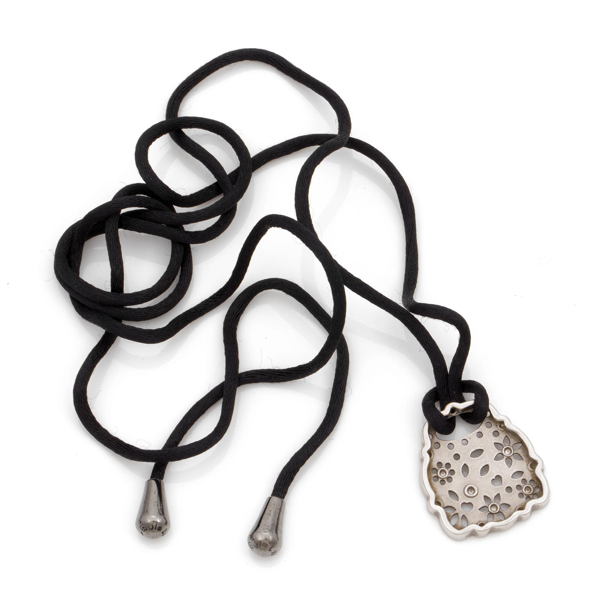 A Charlotte Lyngaard for Ole Lynggaard "Lace" pendant with brilliant cut diamonds total circa 0.11 ct.