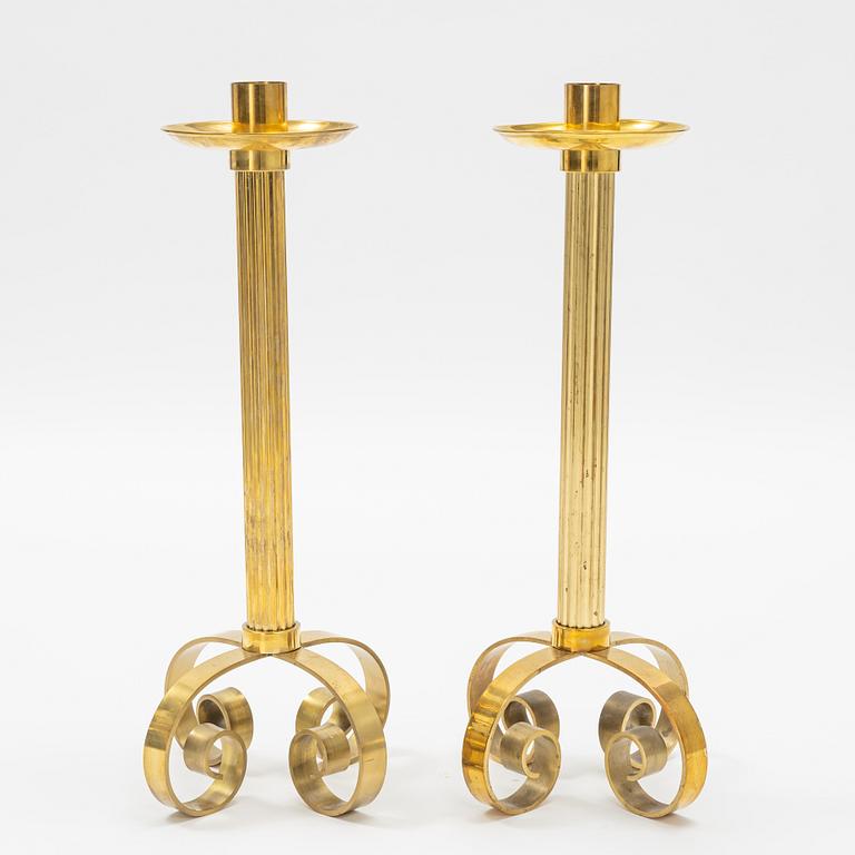 Ivar Ålenius-Björk, a pair of brass candle holders, Ystad Metall.