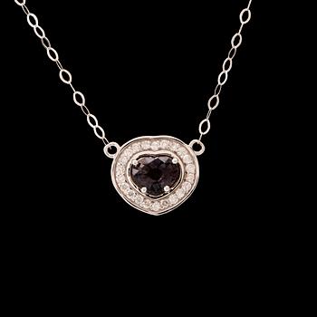 An 18K white gold necklace set with a heart-cut purple sapphire and round brilliant-cut diamonds, Arezzo Italy.