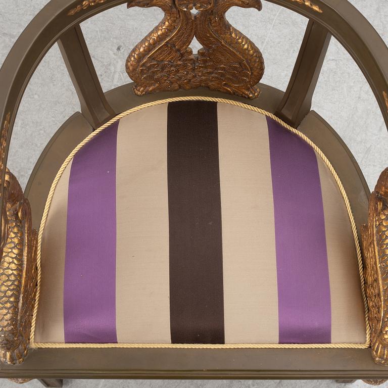 A pair of chairs and a side table, second half of the 20th century. Empire style.