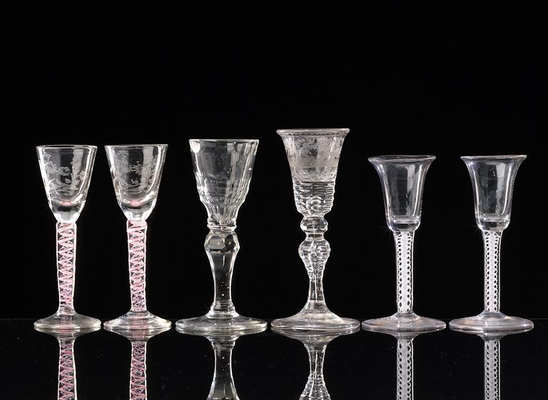 A set of six odd English ale glasses, 18th Century.