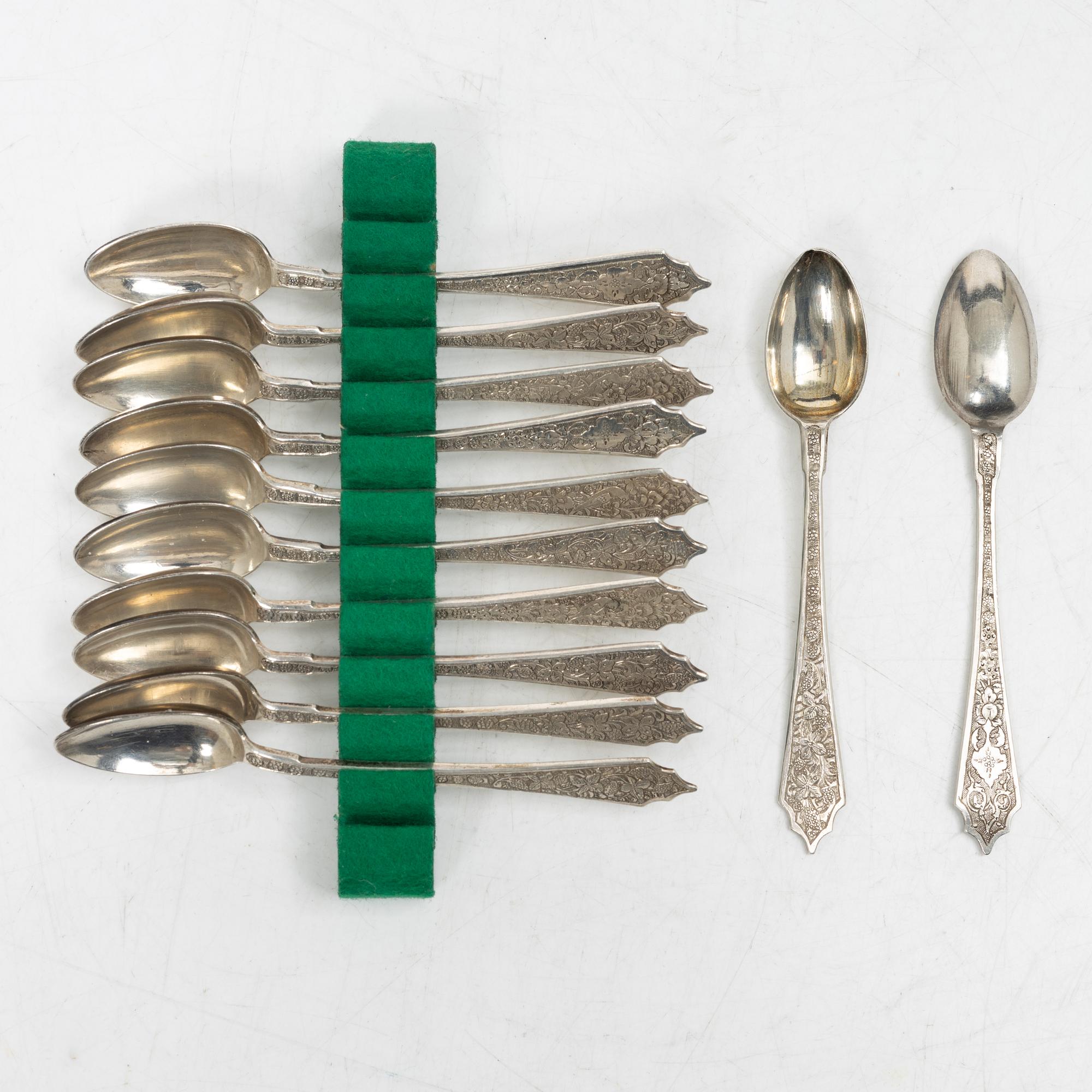 A Persian silver tray, 12 small spoons and six coasters, first part of the 1900s.