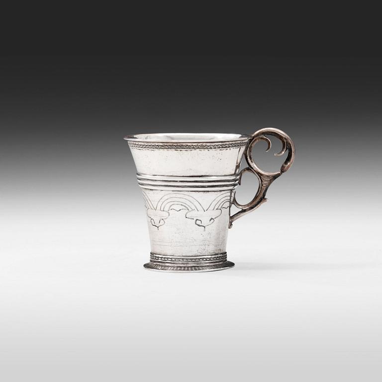 A CUP WITH HANDLE.