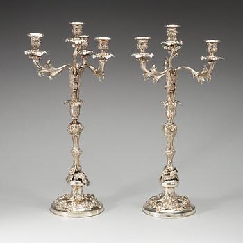 A pair of Swedish 19th century silver candelabra, makers mark of Christian Hammer, Stockholm 1852.